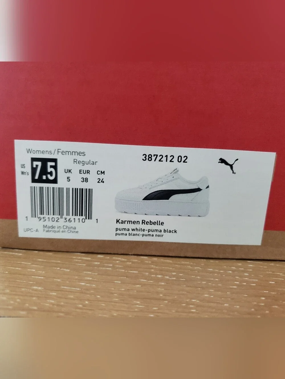Women's Puma White Sneakers with Black Formstrip